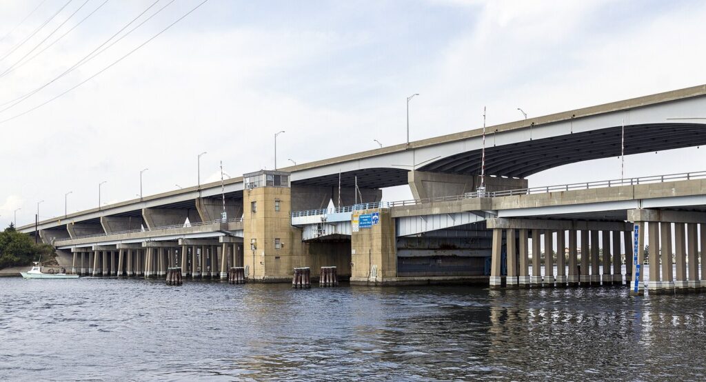 The high US 50 bridge and the lower drawbridge crossing the channel at Kent Narrows