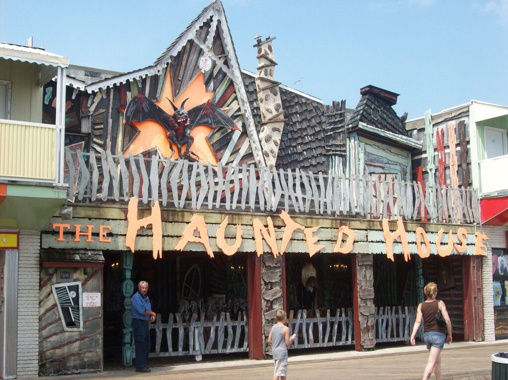 The painted facade of Trimper's Haunted House ride on the Ocean City Boardwalk, with a bat figure on the roof